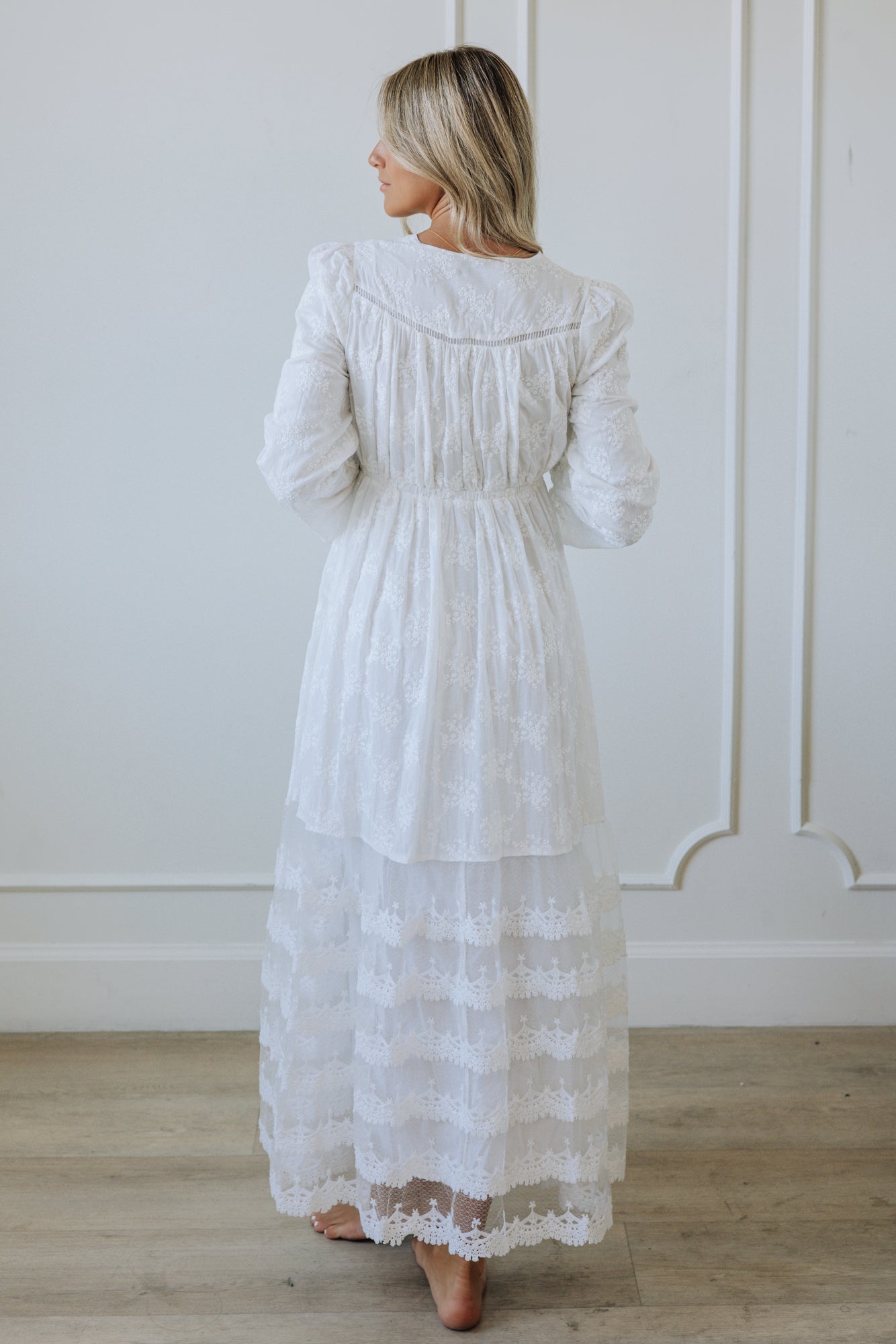 Women wearing mormon white dress