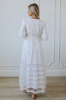 Women wearing mormon white dress