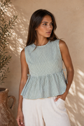 Kailee Gingham Sleeveless Peplum Top in Sage
