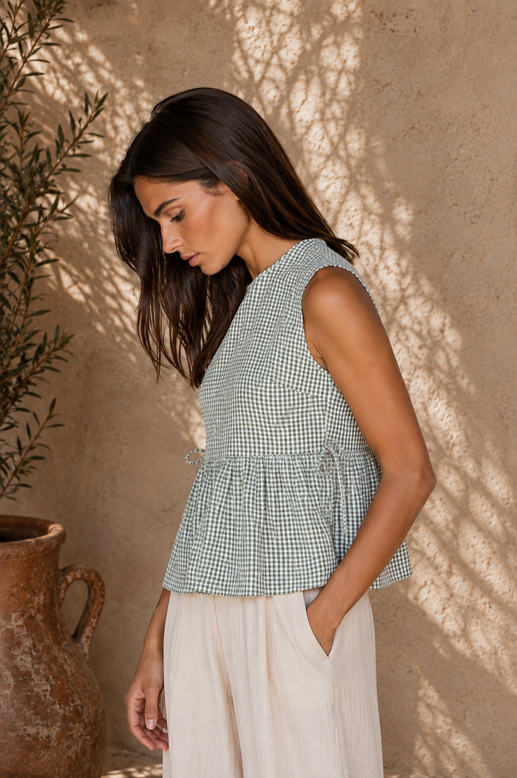 Kailee Gingham Sleeveless Peplum Top in Sage