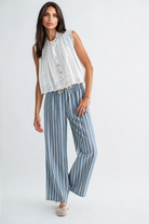 White sleeveless top