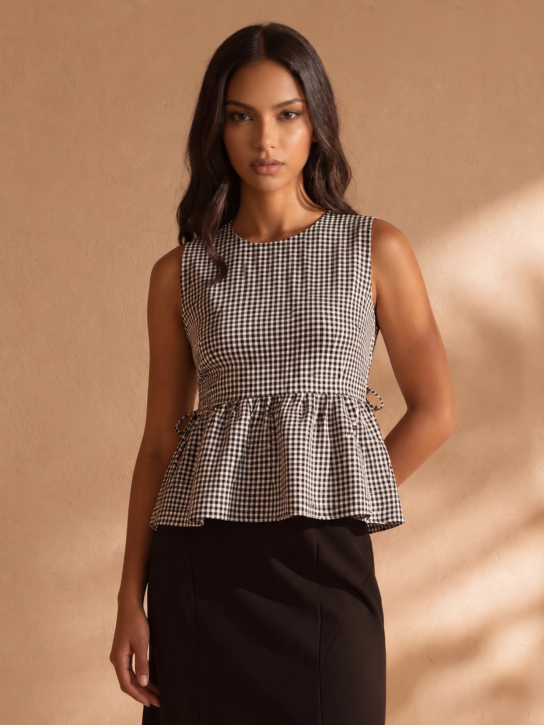 Kailee Gingham Sleeveless Peplum Top in Black