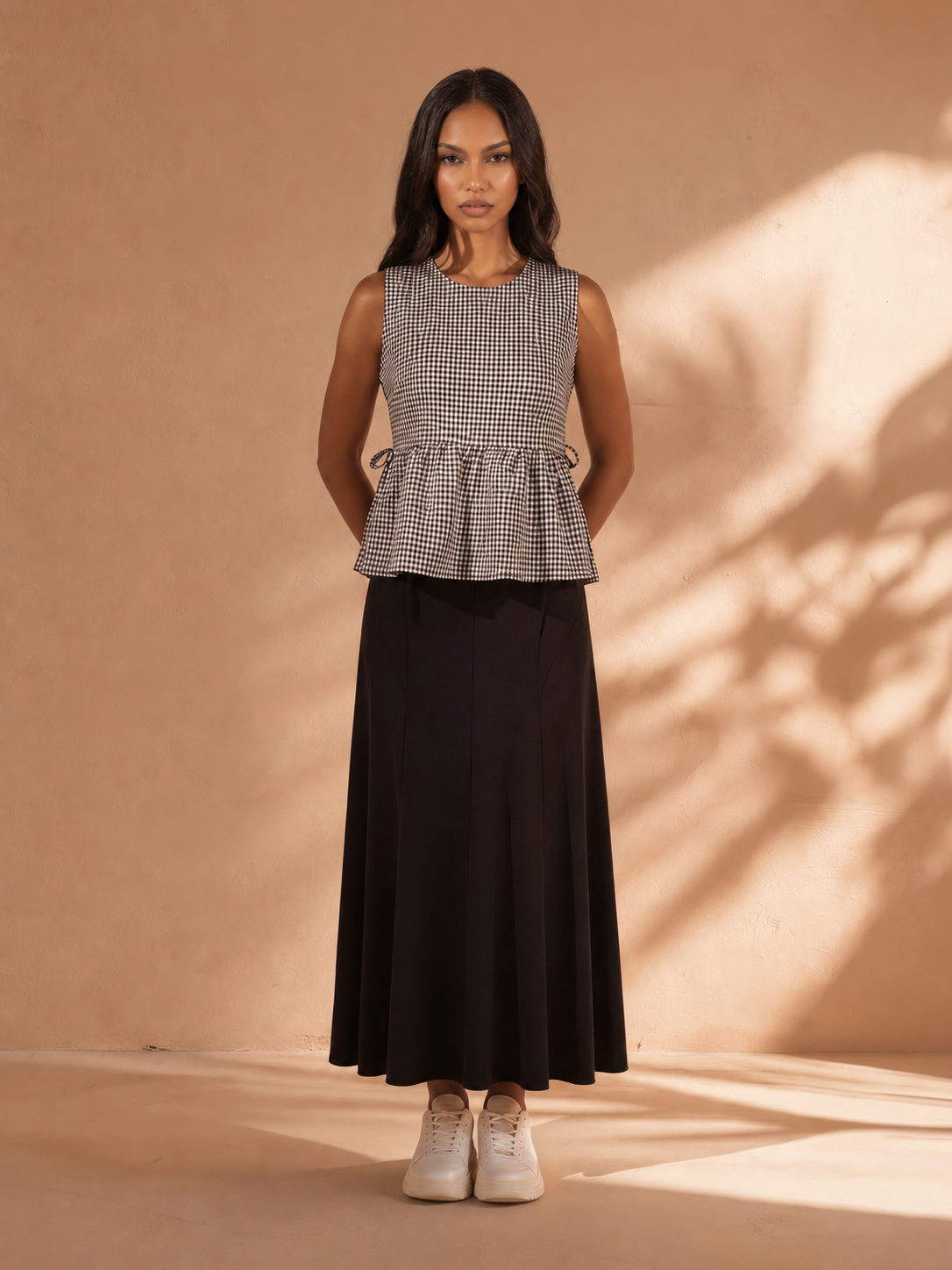 Kailee Gingham Sleeveless Peplum Top in Black