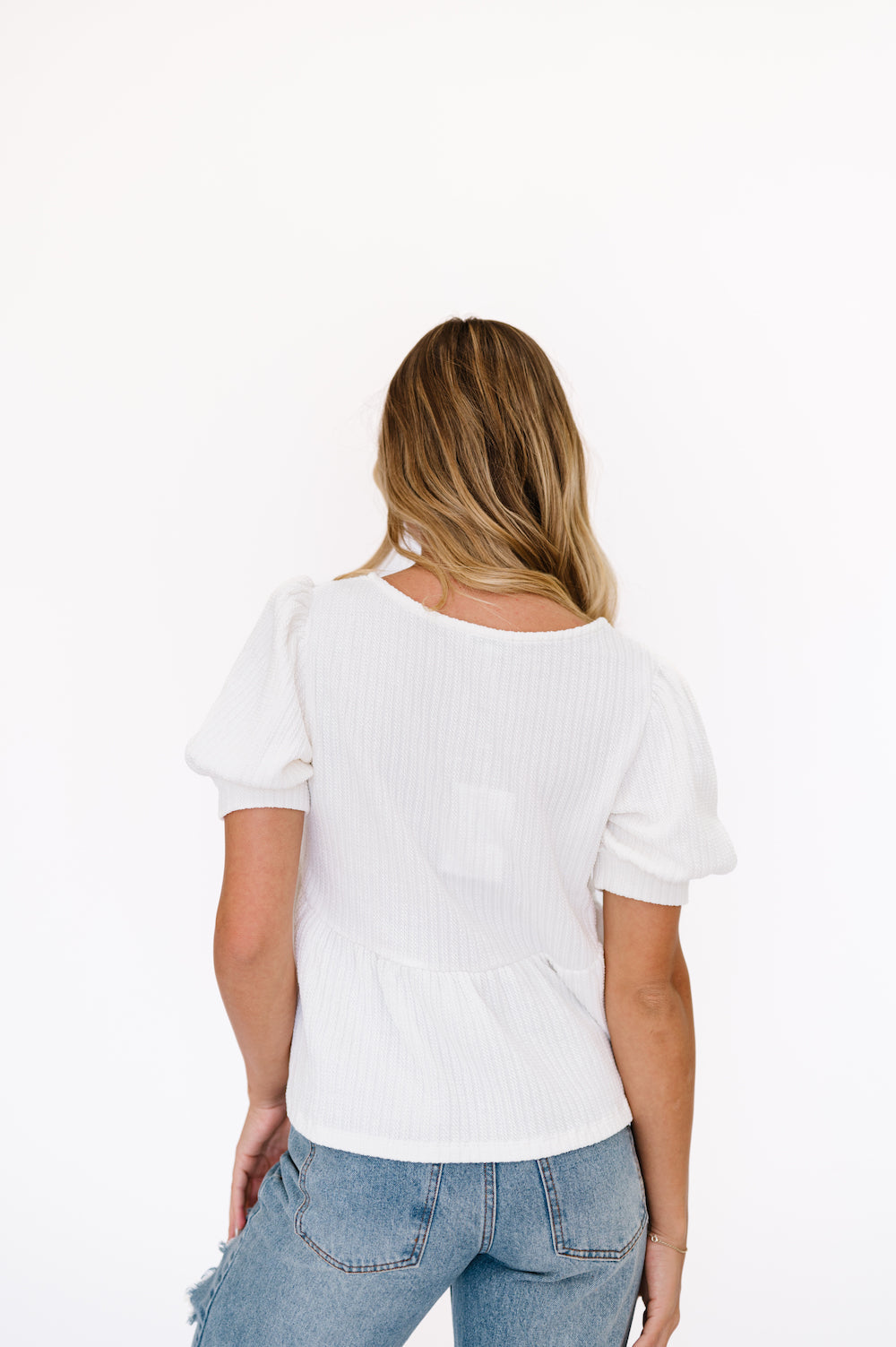 White top with puff sleeves