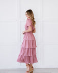 Pink midi dress with tiered skirt