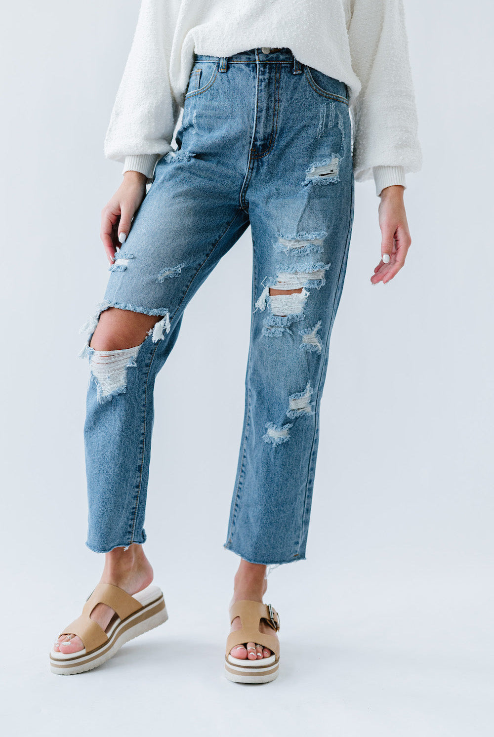 Straight leg pants with distressed details