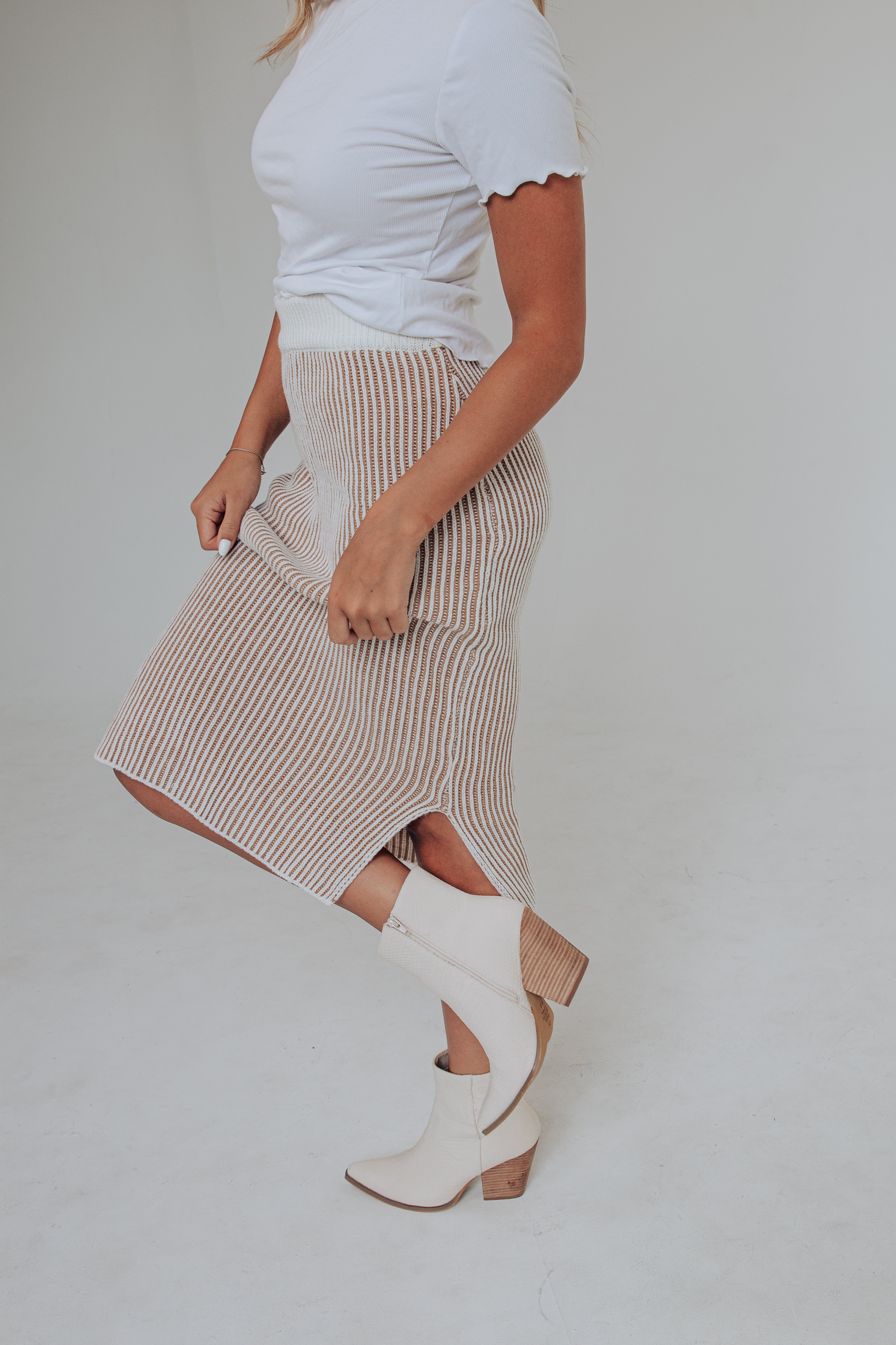 White and tan striped skirt