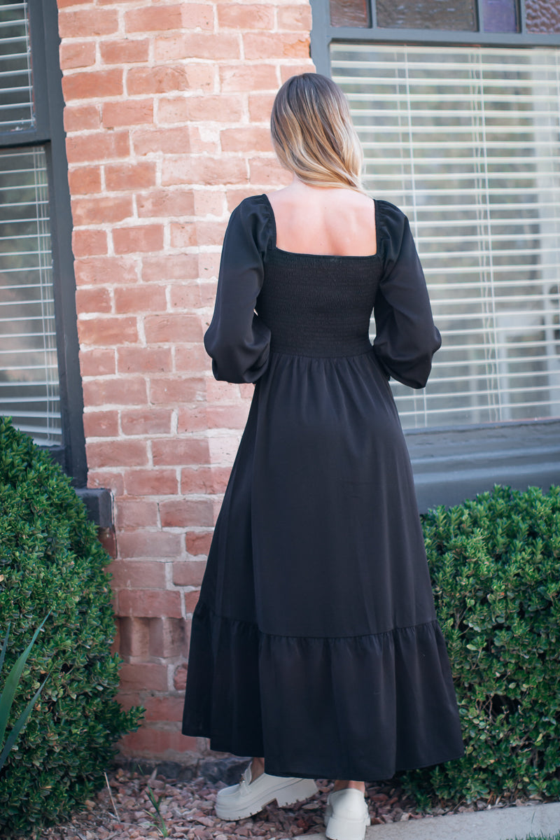 Black dress with square neck
