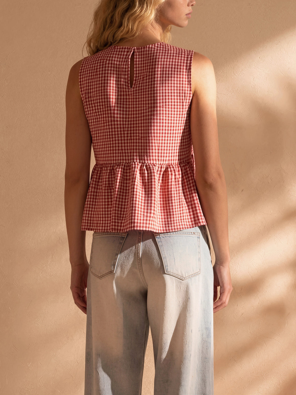 Kailee Gingham Sleeveless Peplum Top in Red