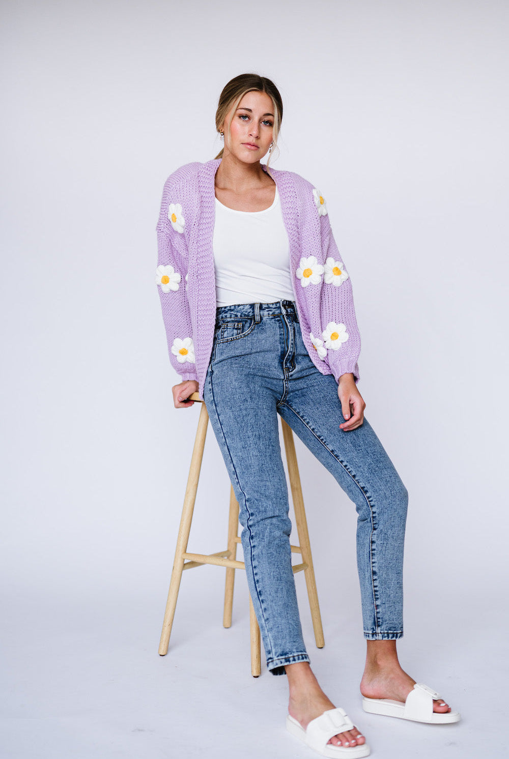 Purple cardigan with white flowers