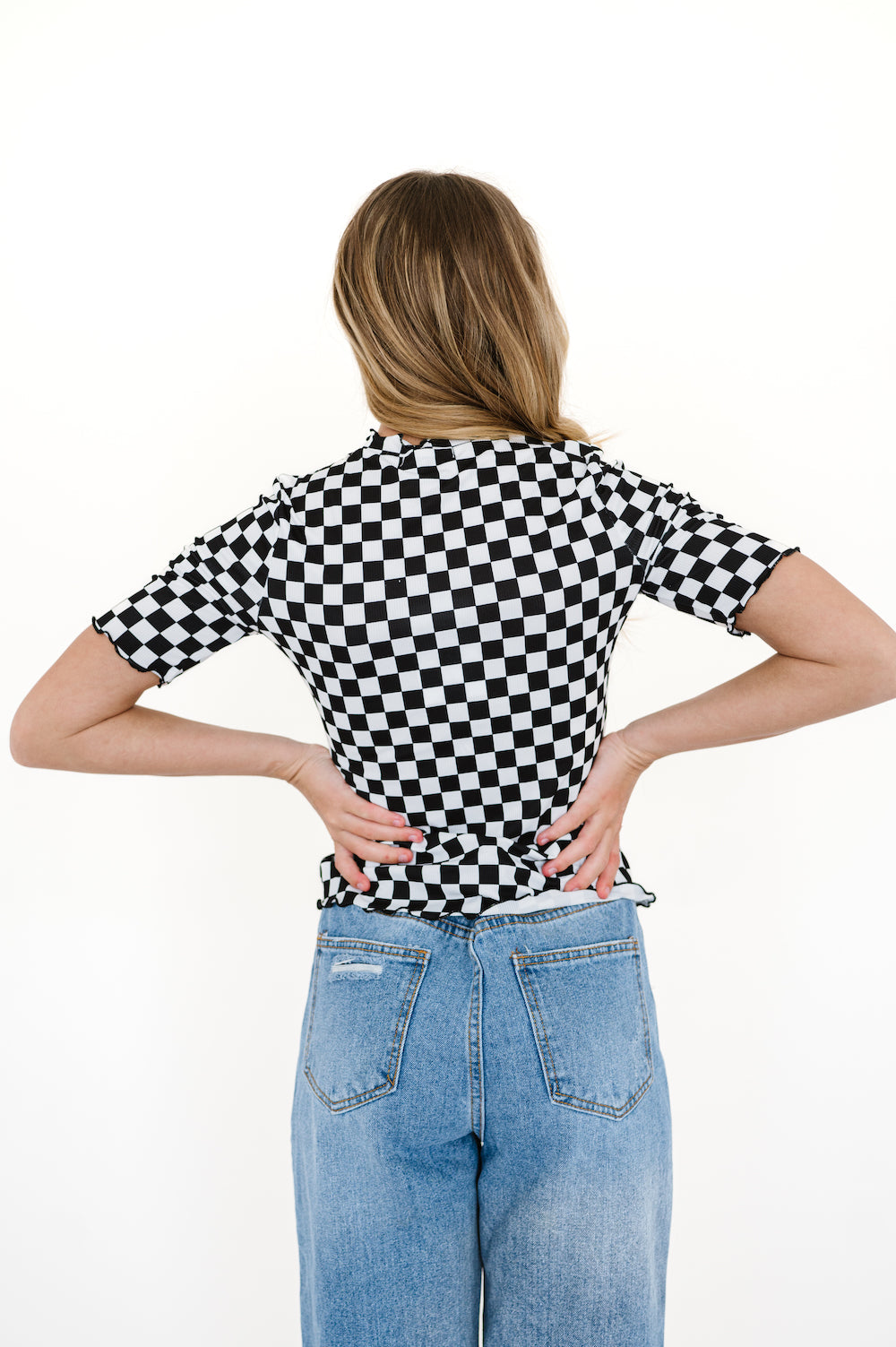 Mock neck top with checkered pattern