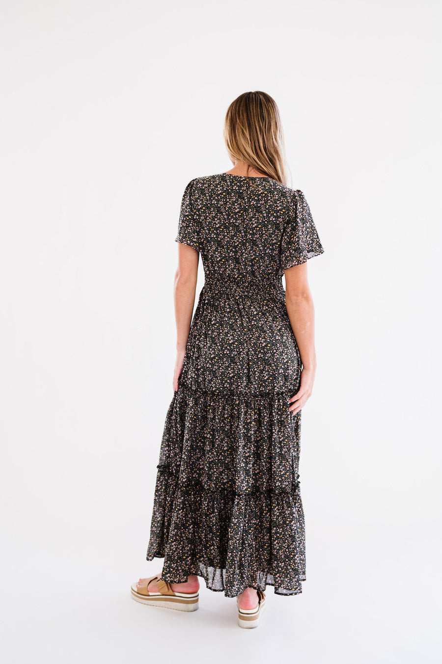 Flowy black dress with floral print