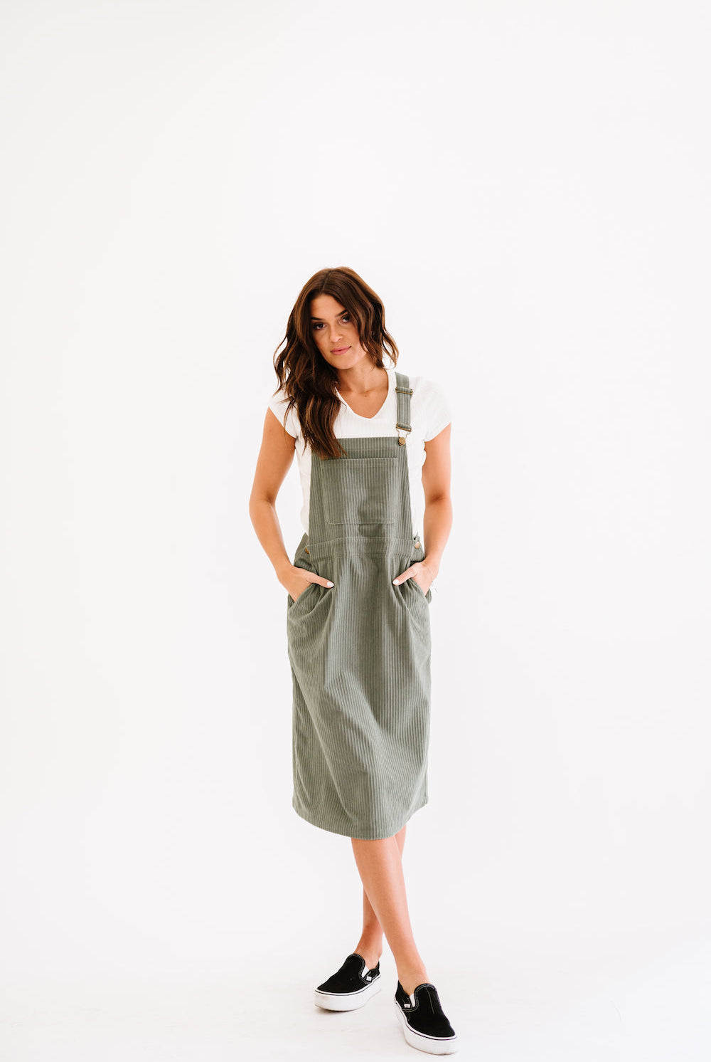Green corduroy dress with pockets