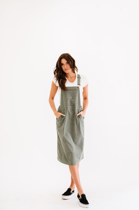 Green corduroy dress with pockets