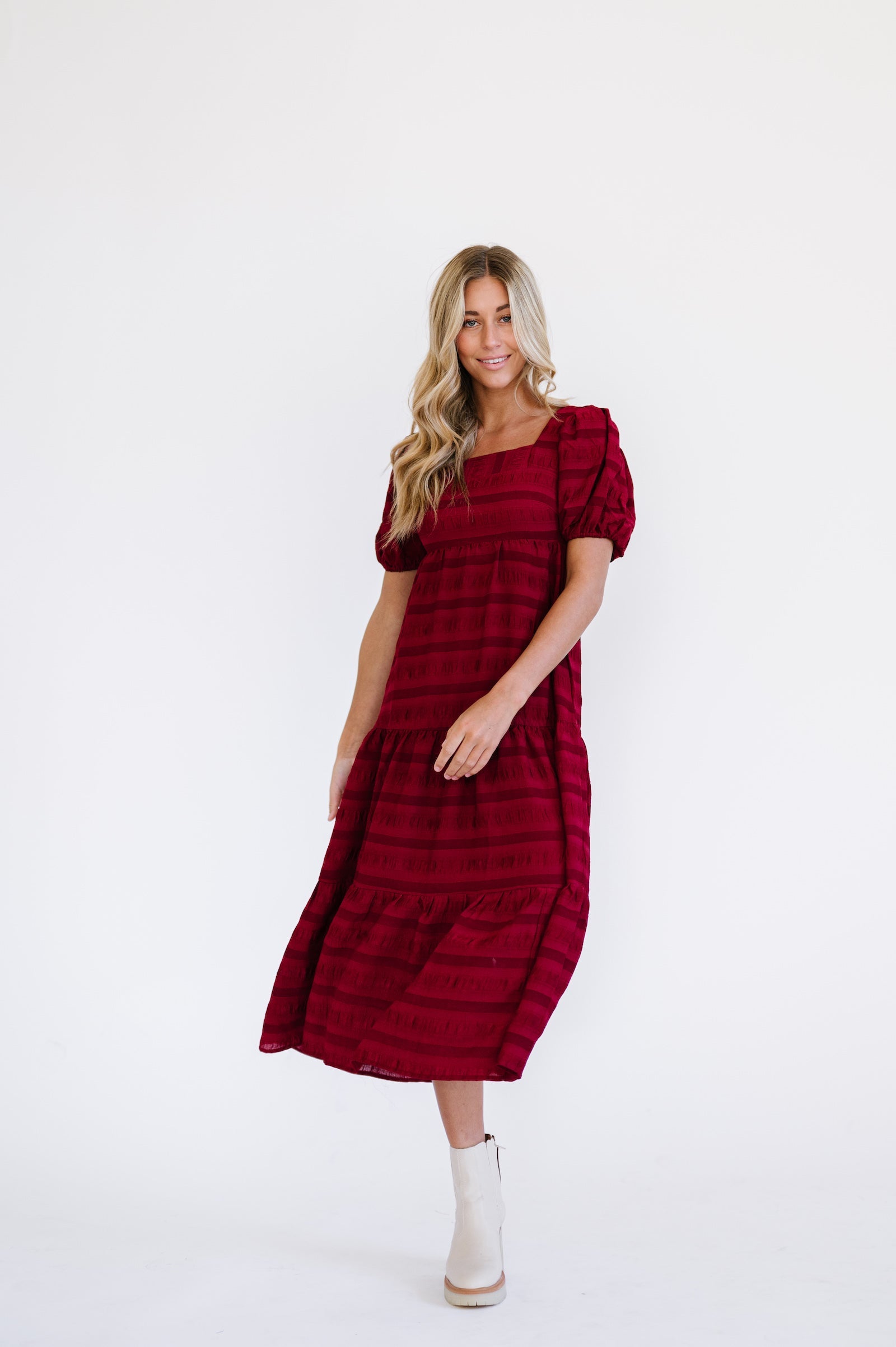 Red midi dress with puff sleeves and square neck