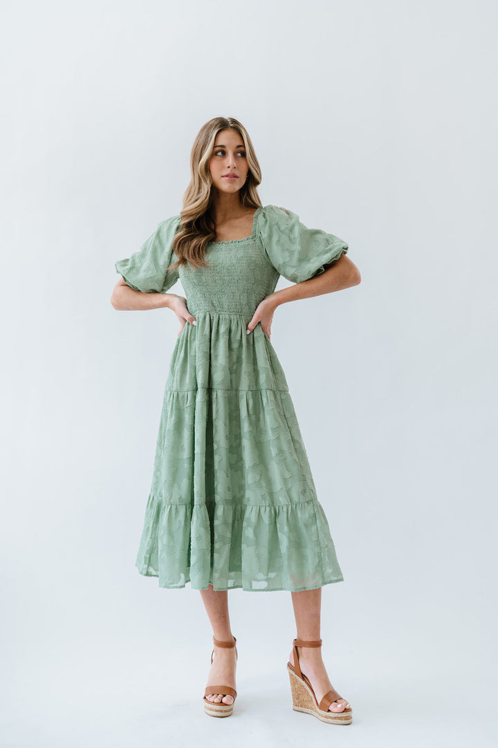 Green midi dress with puff sleeves