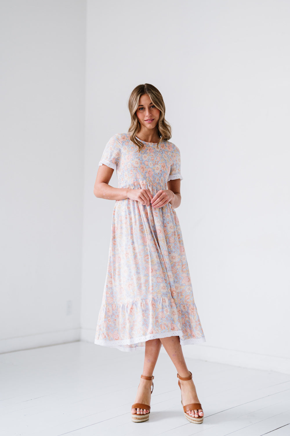 Blue, peach, and yellow floral short sleeve midi dress